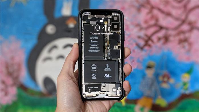 خلفيات من iFixit لـ iphone x يجعله شفافا يعرض كل ما بداخله