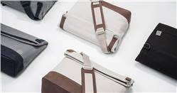 ون بلس تبدأ في بيع حقائب وتيشرتات